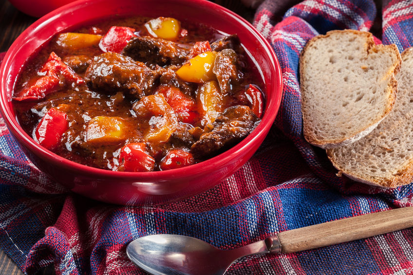 Traditional Hungarian beef goulash with red and yellow pepper